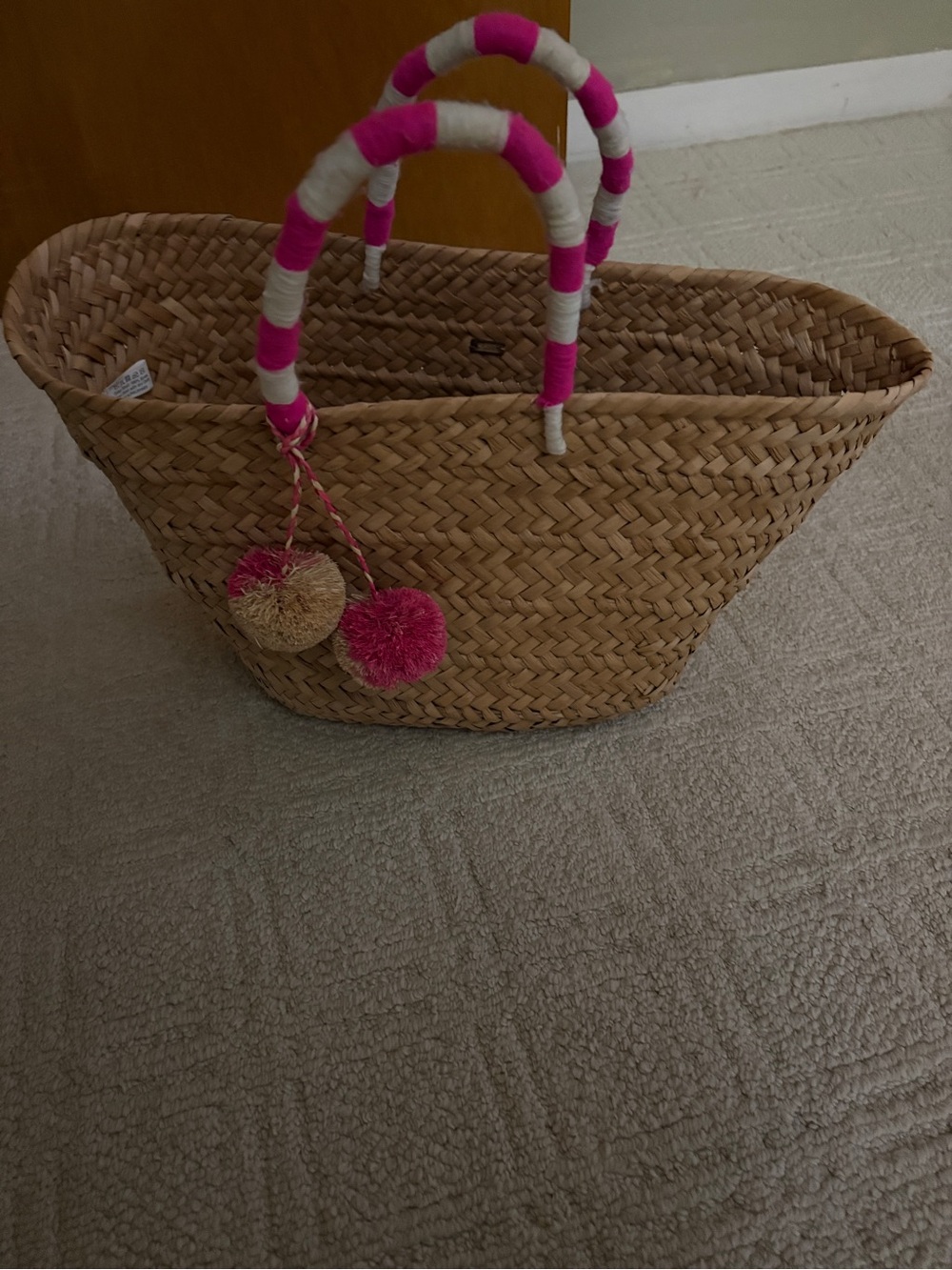 Striped Pink Handle Straw Tote Bag with Pom-Pom Accents